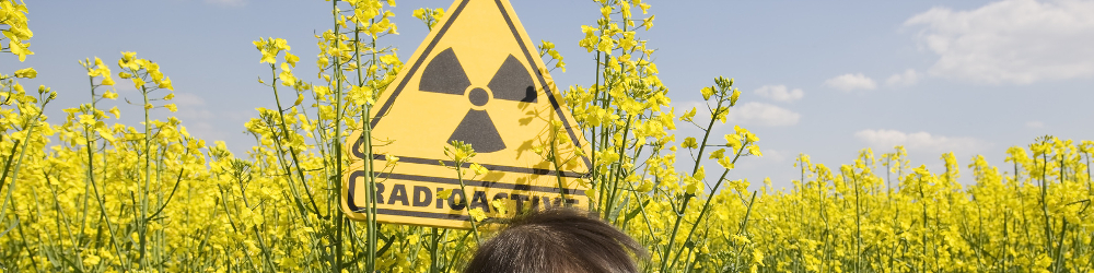 Umweltanalytik - Radioaktivität - Tests - Strahlenwarnzeichen - Kind